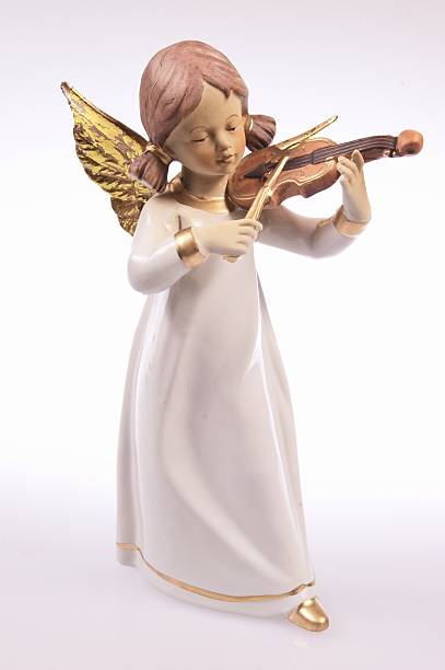 angel girl with the violin stock photo