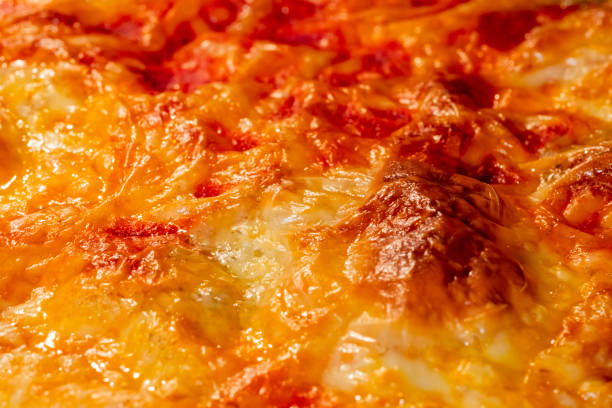 Burnt homemade pizza Margherita: macro, close up Burnt pizza Margherita with mozzarella cheese and tomato ketchup - close up, macro. Italian cuisine, homemade bakery, fast food, failure, problem concept pizza topping stock pictures, royalty-free photos & images