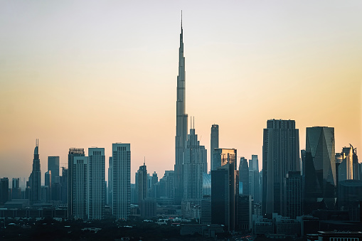 Panorama and aerial view of Dubai in a summer day in the evening at sunset, United Arab Emirates