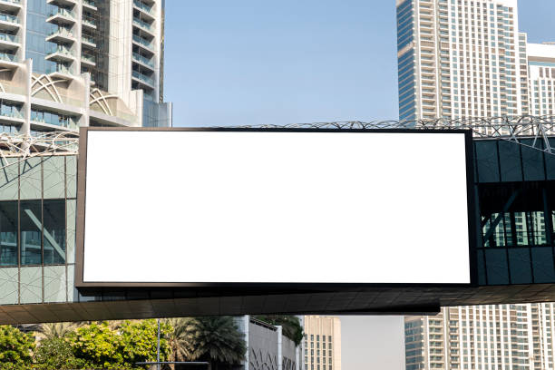 istock electronic scoreboard with an empty white screen on a city street. Copy space. Advertising on the road. 1458463621