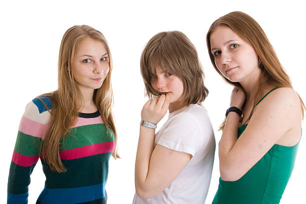 istock Three attractive girls isolated on a white 145846609