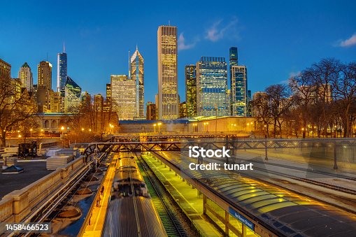 istock Metra Train Station and Chicago Cityscape 1458466523