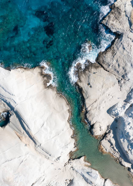 istock White chalk cliffs in Sarakiniko, Milos island, Cyclades, Greece 1458467043