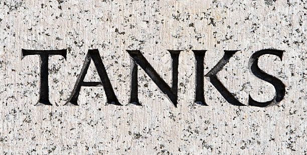 istock Word "Tanks" Carved in Gray Granite 145846793