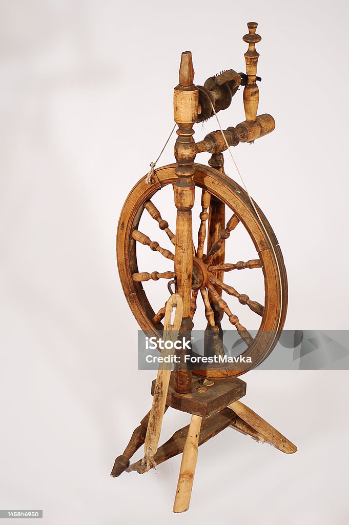 spinning-wheel antique wooden spinning-wheel Ancient Stock Photo