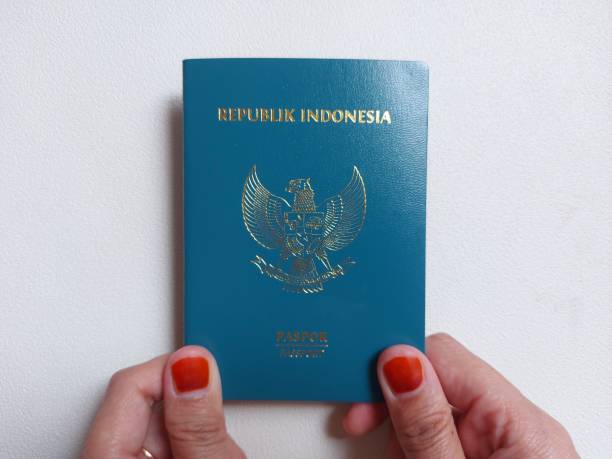 istock Indonesian passport in green cover. 1458470279