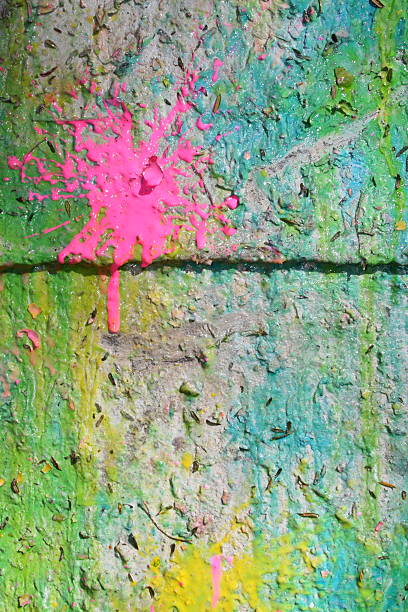 Background: paint splatter on concrete wall stock photo