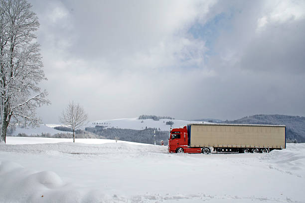 istock Red Truck in Snow 145847377