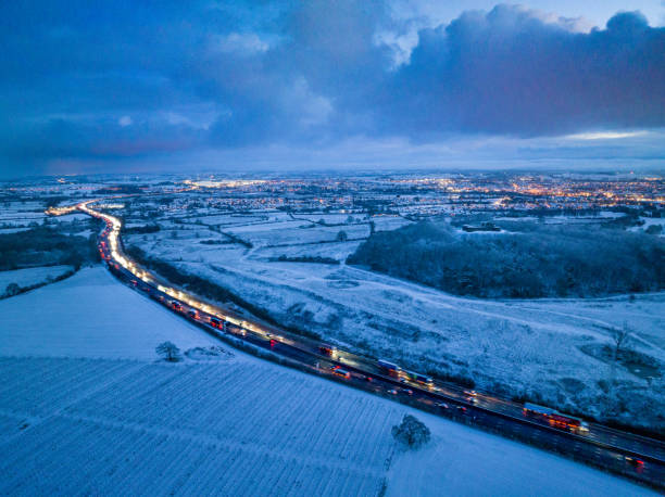 Aerial View of snowy M6 Motorway and Stafford Castle at dawn stock photo