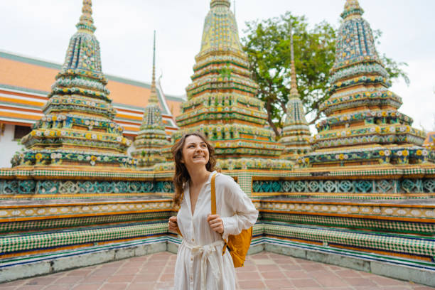 istock Woman exploring  Wat Pho in Bangkok 1458486815