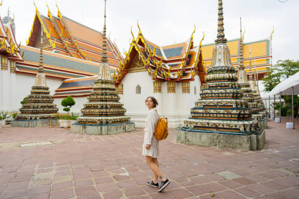 istock Woman exploring  Wat Pho in Bangkok 1458486873