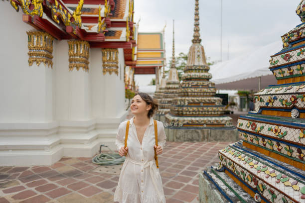 istock Woman exploring  Wat Pho in Bangkok 1458486886