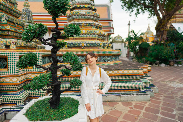 istock Woman exploring  Wat Pho in Bangkok 1458487053
