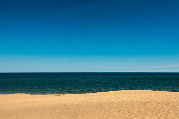 istock Beach - sea - sky. Orange / yellow - dark blue - light blue 1458487313