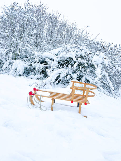 istock Wooden sled on a snowdrift 1458487972