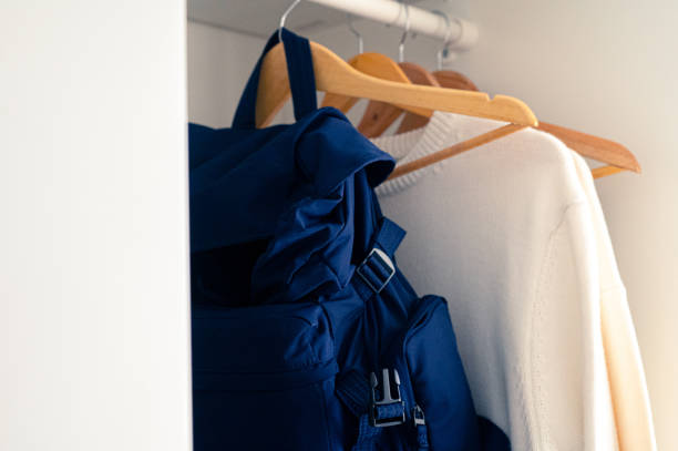 istock Clothes and Bag in a Closet 1458491359