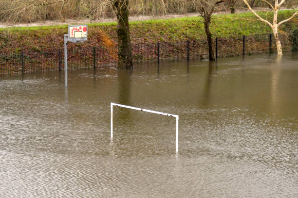 istock Goal posts on a flooded football field 1458492025