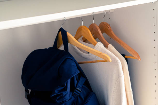 istock Closet with Clothes and Bag in a Hanger 1458492228