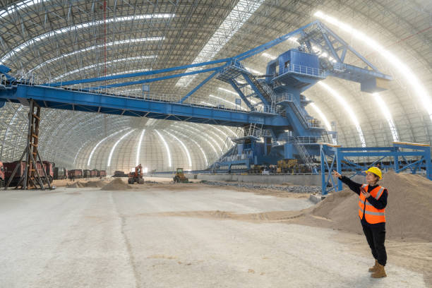 istock A female technician works at a large freight construction site 1458495088