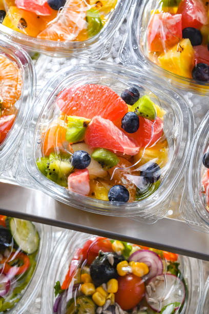 istock Boxes with pre-packaged fruit salads in a commercial fridge 1458497157