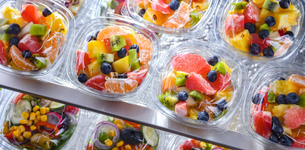 istock Boxes with pre-packaged fruit salads in a commercial fridge 1458497195