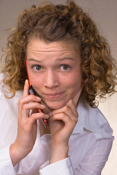 Teenage Girl Talking on Cell Phone stock photo
