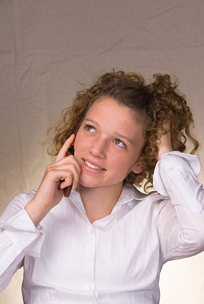 Teenage Girl Talking on Mobilel Phone stock photo