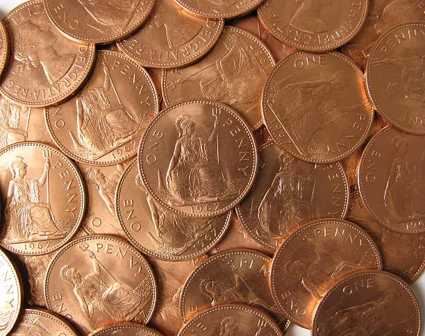 Photo of Pile of UK pre-decimal one penny coins