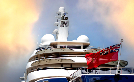 Luxury with great design yacht and Britain navy flag