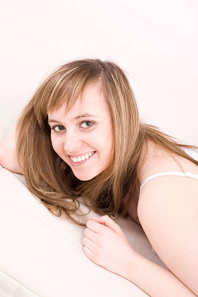 Beautiful young woman relaxing stock photo