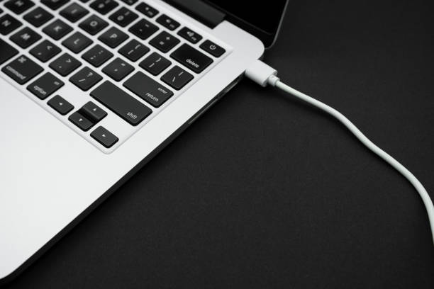 istock A modern laptop is standing on a black office table. Technology concept 1458499839