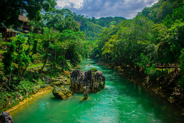 Roca Grande in Rio Verde with trees roca grande en rio verde con arboles semuc champey coban alta Verapaz guatemala landscape stock pictures, royalty-free photos & images