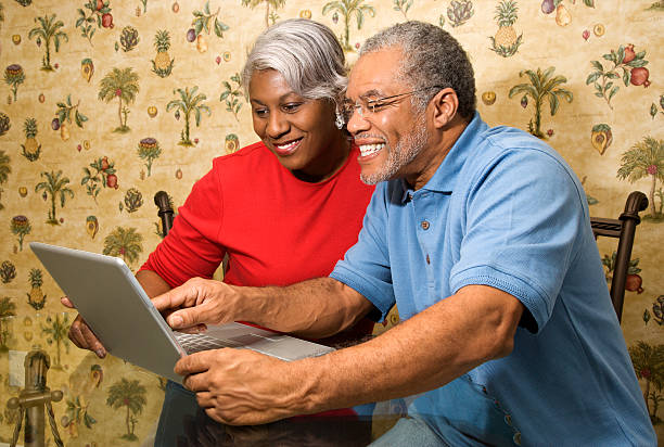 istock Mature couple looking at laptop. 145850515