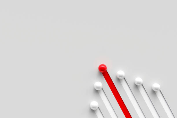 istock concept of leadership and differentiation, steps to excellence, and teamwork. red ball front white ball one way on white background. 1458507108