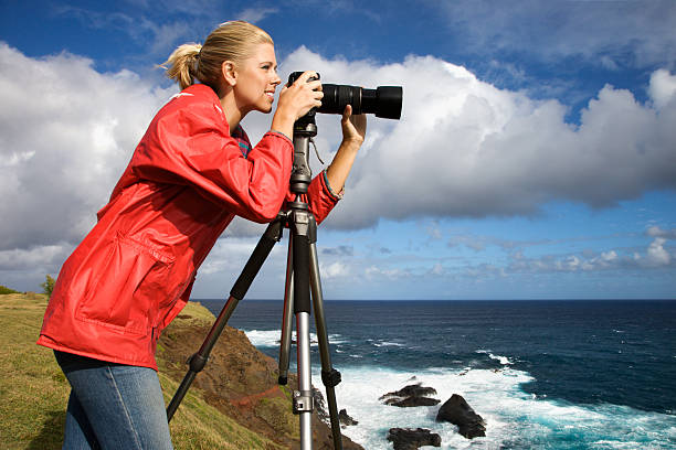 istock Woman photographing in Hawaii. 145850825