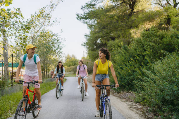 istock High school girls riding bicycles 1458508694