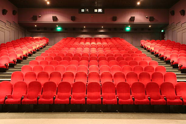 istock Empty movie theater with red seats 145851356