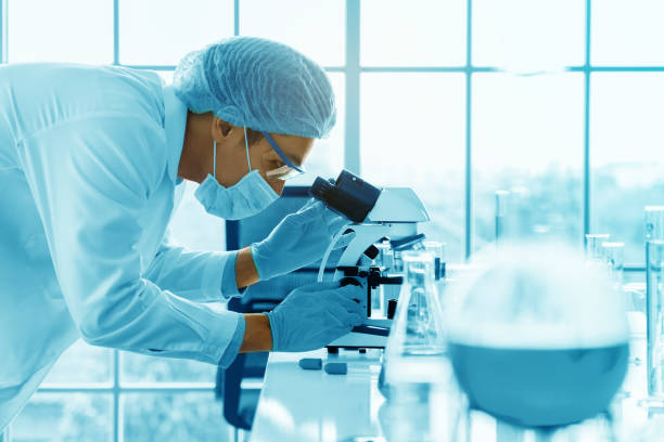 istock Scientists are using a microscope to test for viruses. or bacteria in the laboratory. Culture testing for the treatment of various diseases such as cancer, diabetes and COVID-19. 1458515126