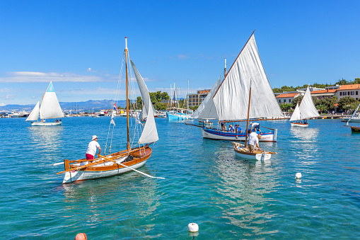Malinska, Krk Island, Croatia - September 10, 2022: Classic sail boat regatta in Mediterranean sea