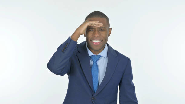 istock Searching African Businessman on White Background 1458515657