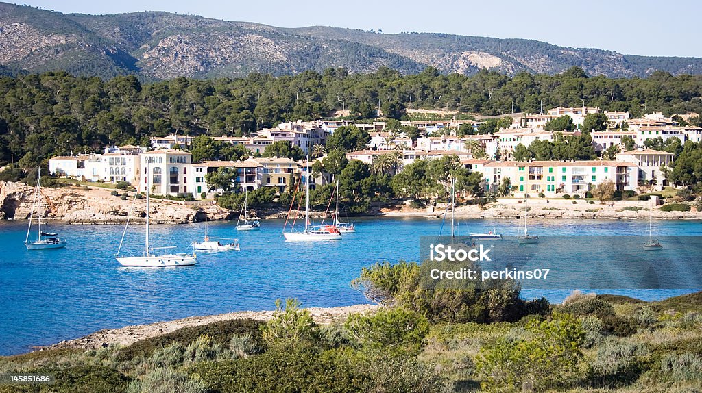 Beautiful bay. Boats rest on the lovely turquoise water. Anchored Stock Photo