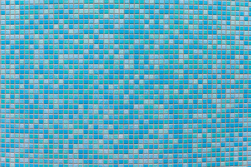 Swimming pool blue turquoise mosaic wall background