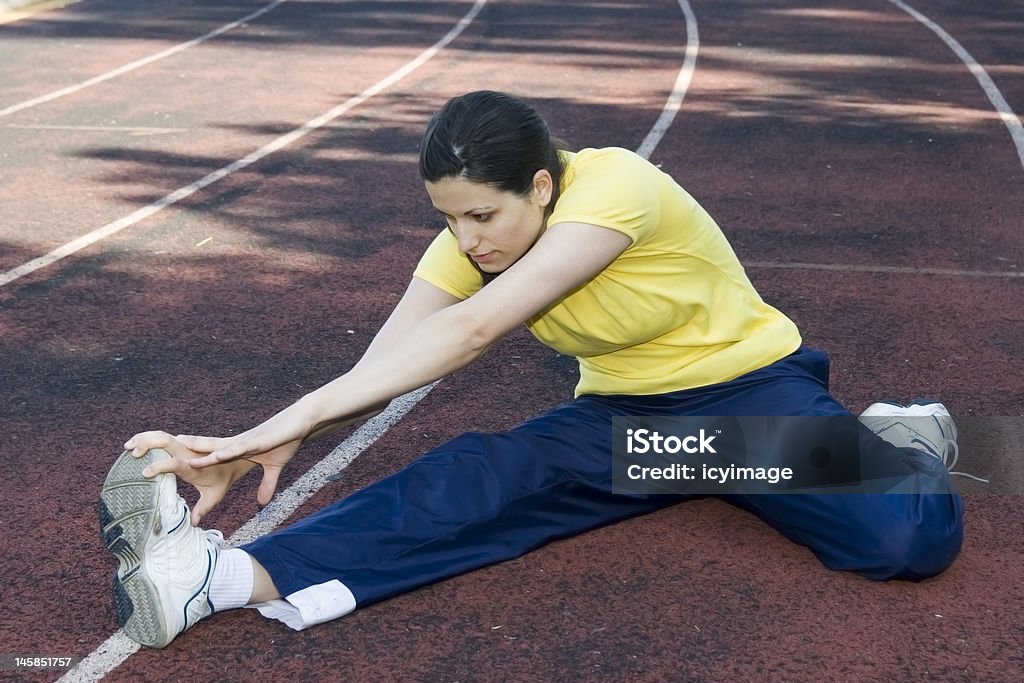 Giovane donna esercizio - Foto stock royalty-free di Adulto