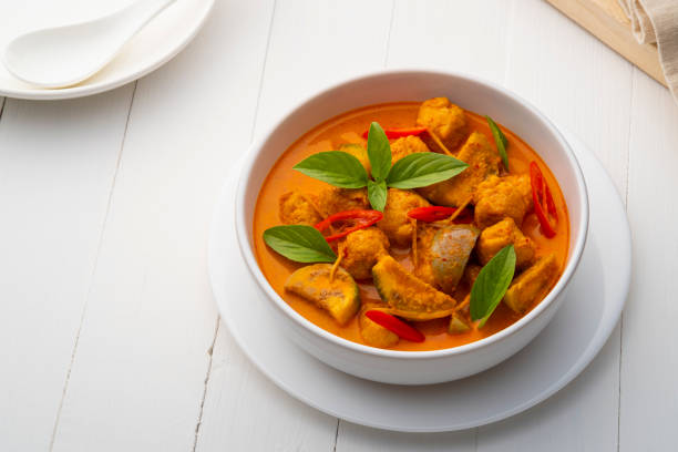 istock Red curry with clown featherback fishball in white bowl (Gaeng Kua Look Chin pla) 1458521141