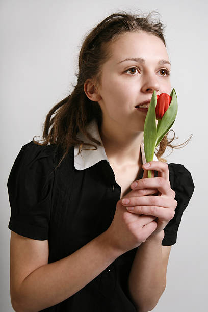 istock Girl with a tulip 145852149