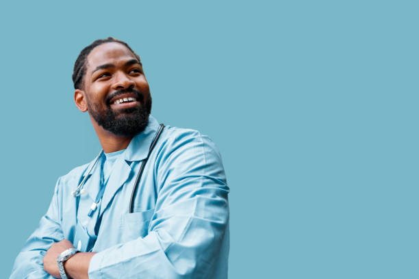 Successful health worker isolated on blue