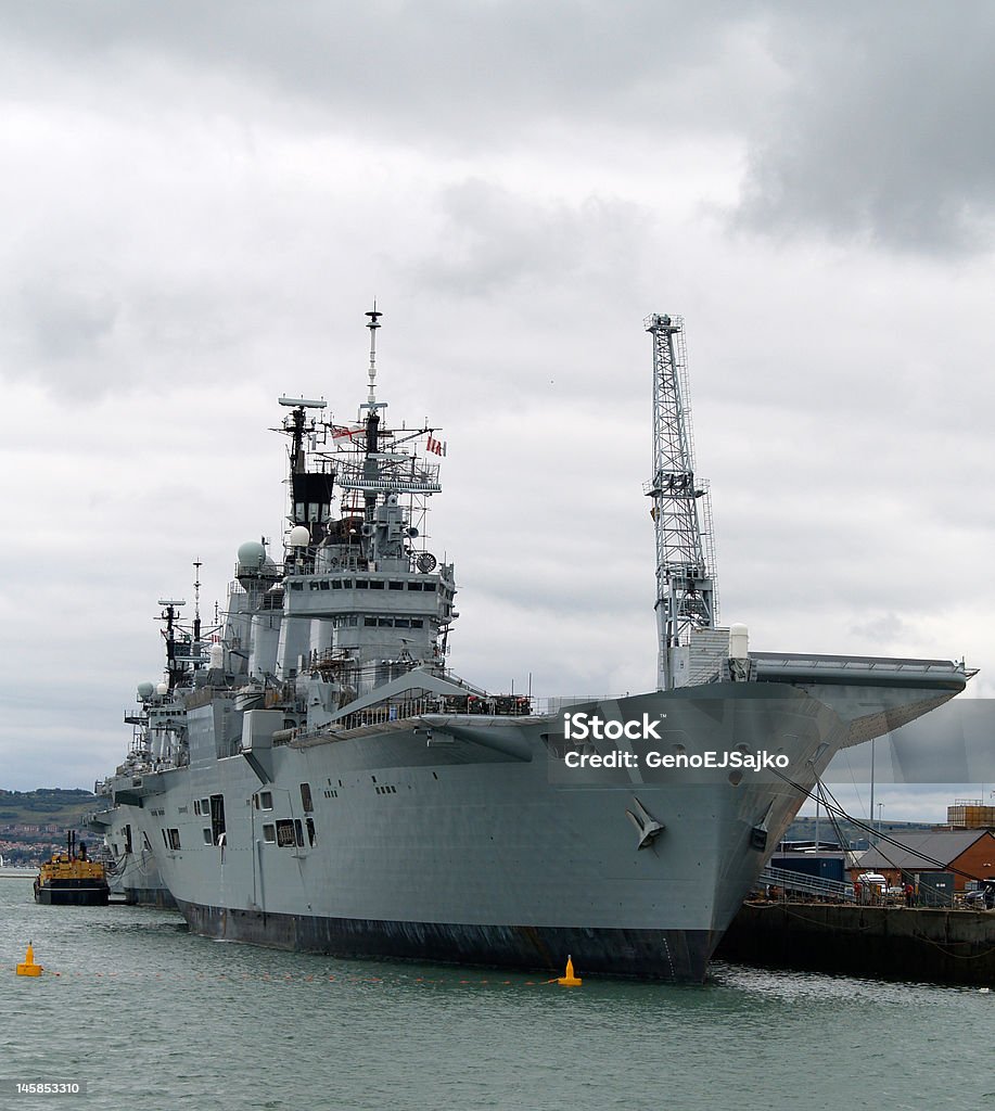 British Aircraft Carrier Naval Ship British Aircraft Carrier Naval Ship tied alongside. Navy Stock Photo