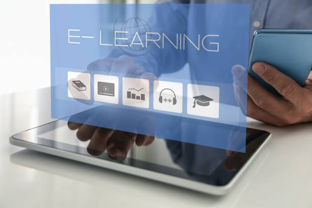 istock E-learning, education, study online concept. Closeup of man hands using tablet and smartphone. 1458537835