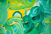 Abstract painting in green and yellow color.