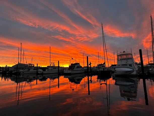 istock Sunrise over a marina 1458539641
